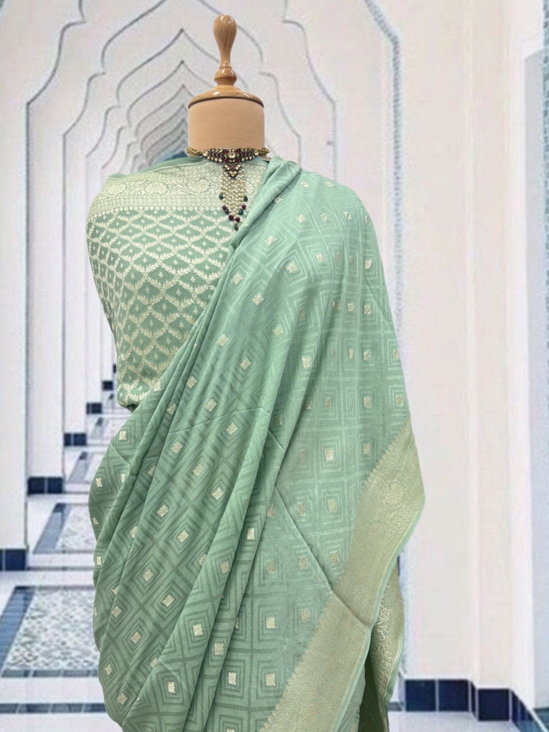 Evelyn Sea Green Crepe Silk Saree