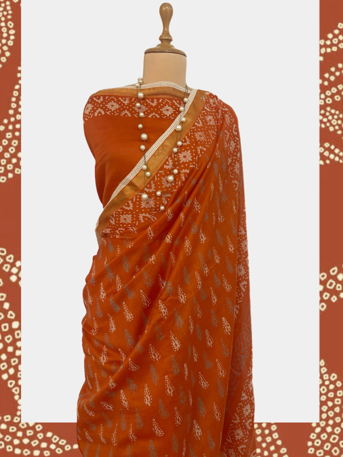 Dilwara Orange Cotton Dabu Batik Saree