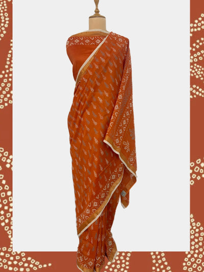 Dilwara Orange Cotton Dabu Batik Saree