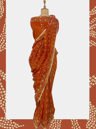 Dilwara Orange Cotton Dabu Batik Saree