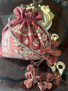 Dharini Brick Rust Gota Work Potli