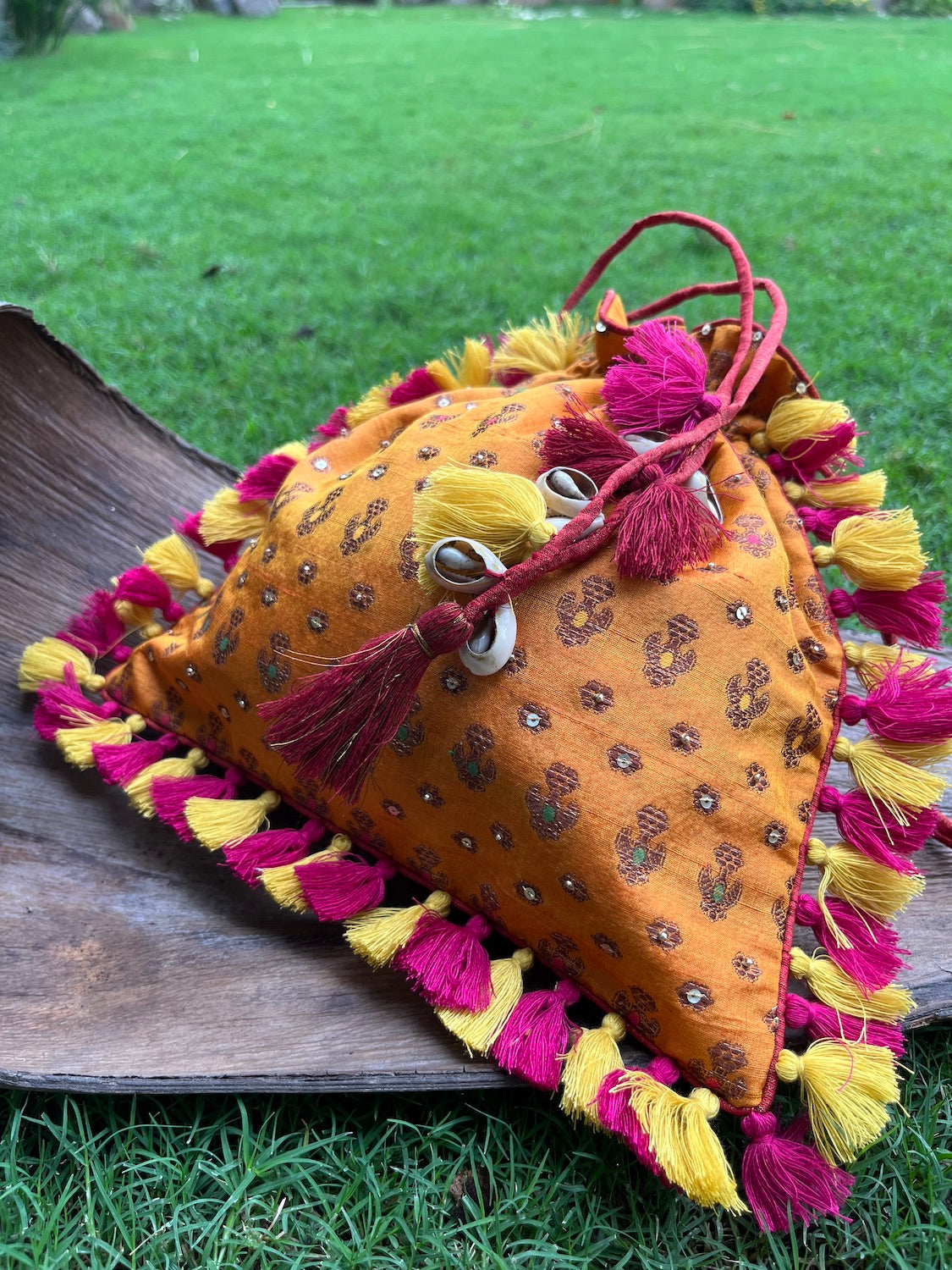 Amrapali Kesari yellow Brocade Potli