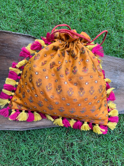 Amrapali Kesari yellow Brocade Potli