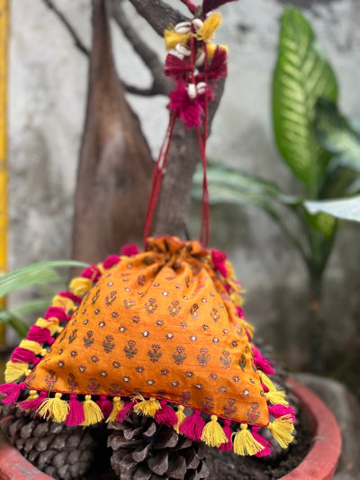 Amrapali Kesari yellow Brocade Potli