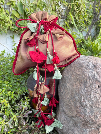 Talking Bird Maroon Tissue Potli