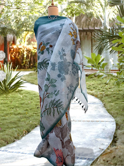 Chirpy Morning Sky Blue printed Organza Saree