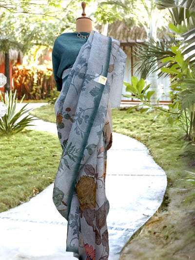 Chirpy Morning Sky Blue printed Organza Saree