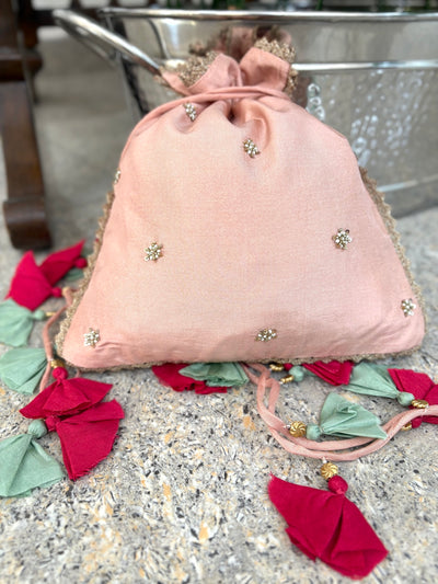 Talking Bird Powder Peach Silk Potli